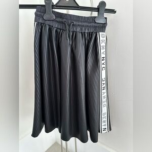 Girls DKNY black skirt . Size 8. Excellent condition